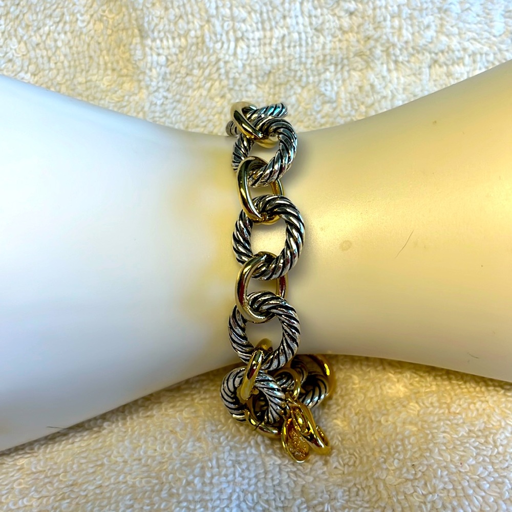 Premier, gold, and silver bracelet